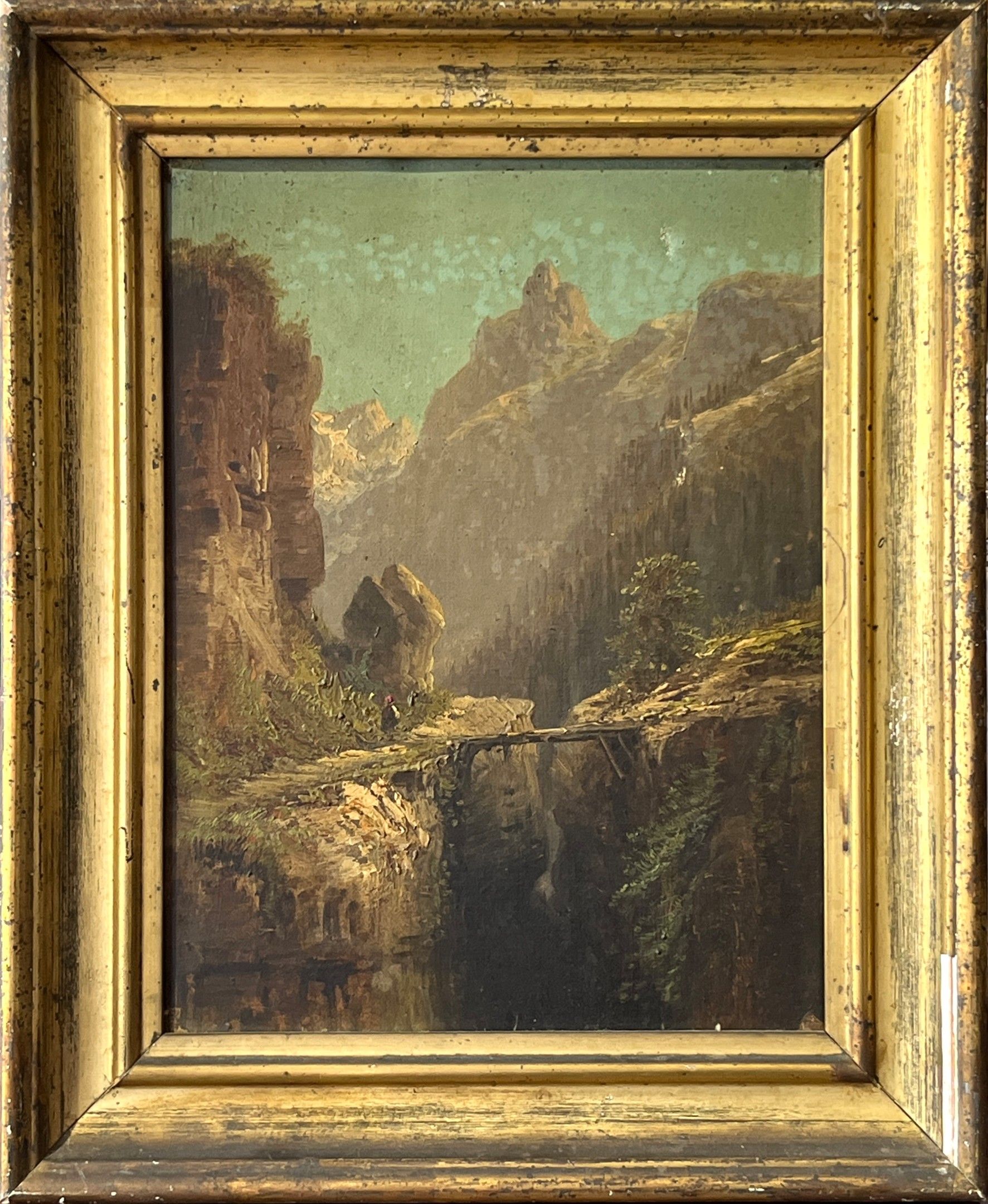 Ecole du XIXe siècle. Paysage au pont dans les montagnes. Huile sur toile. 32 x 25 cm. Accidents. Cadre en bois moulu...