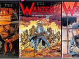 four books of western comics are lined up on a shelf