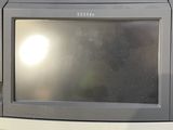 an image of a microwave oven with a screen on it