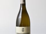 a bottle of wine that is sitting on a table