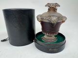 a small lamp that is sitting in a black box