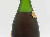 a bottle of alcohol that is sitting on a table