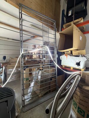 a picture of a room with a lot of boxes and hoses