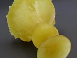 a piece of fruit that is sitting on a table