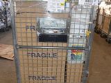 a metal cart with a sign on it in a warehouse