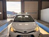 a white car that is parked in a parking garage