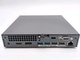the back view of a small computer with two ports on it