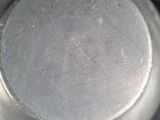 a close up view of a metal pan with a lid