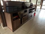 a kitchen that has a lot of cabinets in it