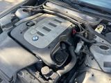 a picture of a car engine with its hood open