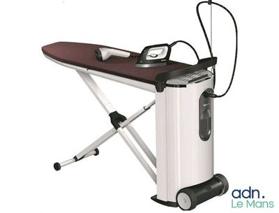 an ironing board with a iron on top of it