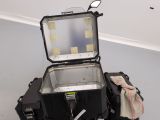 a suitcase that is sitting on top of a luggage case