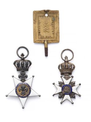 trois médailles et une médaille sur fond blanc