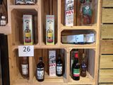 many bottles of alcohol on the shelves in the store
