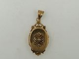 a close up of a gold locke on a white surface