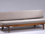a couch that is sitting on a table in a room