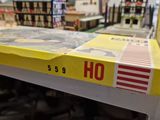 a yellow box with a picture of a town on it