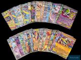 the pokemon cards are lined up in a row on a black background