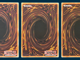 three cards with a picture of a black hole in the middle of them
