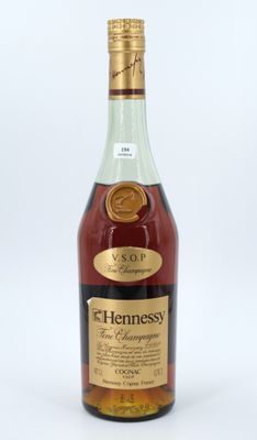 a bottle of hennesy brandy on a white background