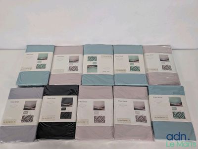 a lot of sheets that are sitting on a table