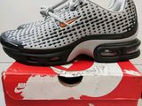 the nike air max 95 is on top of a box