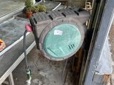 a table that has a clock on it in the middle of a yard
