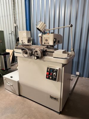 an image of a machine that is sitting in a garage