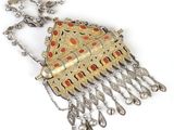 an image of a silver and gold necklace with red stones