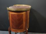 an image of a small wooden table with a tray on top