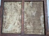 an old window with a dirty glass in it