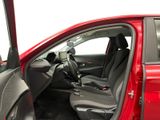 the interior of a red car with the door open and the driver ' s seat down