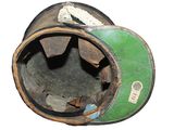 a close up of a green and black helmet on a white background