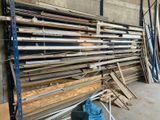 several pieces of wood are stacked up in a warehouse