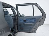 a car that has its door open on the floor