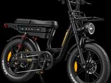 a close up of a black electric bike on a black background