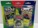 a close up of a package of pokemon cards on a white surface