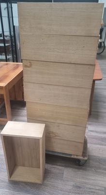several pieces of furniture sitting on top of a hard wood floor