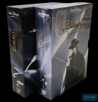 two boxed boxes with the cover of a movie and the cover of a movie