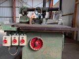 a machine that is sitting on a pallet in a warehouse
