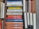 a box full of books sitting on the floor