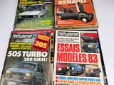 several magazines of different models of cars are on a table