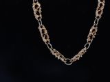 a close up of a necklace on a mannequin mannequin mannequin mannequin mannequin mannequin mannequin mannequin