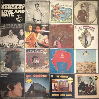 a picture of a collage of records on the wall