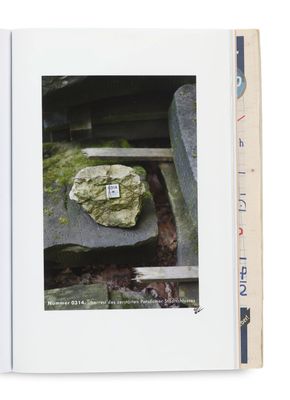 a book with a picture of a rock in the middle of it