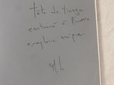 a note written on a piece of paper on a table