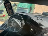 a picture of a car dashboard with a cell phone in it
