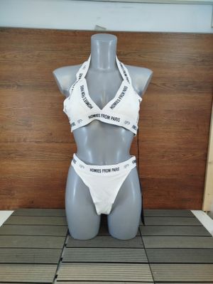 a mannequin wearing a white bra and panties on display