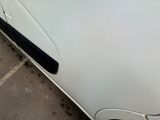 a close up of a car door handle on the side of the car