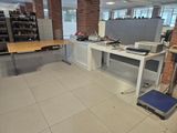 an image of a room with a desk and a printer